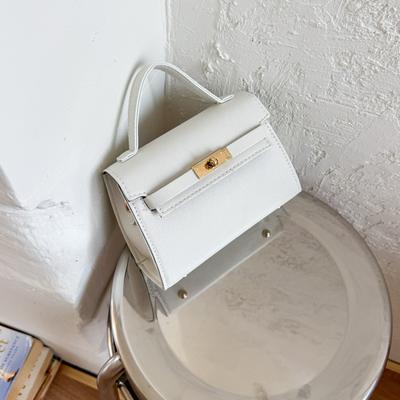 Primavera y verano nuevo temperamento versátil moda para ir al trabajo alta textura color sólido simple bolso de mano bandolera