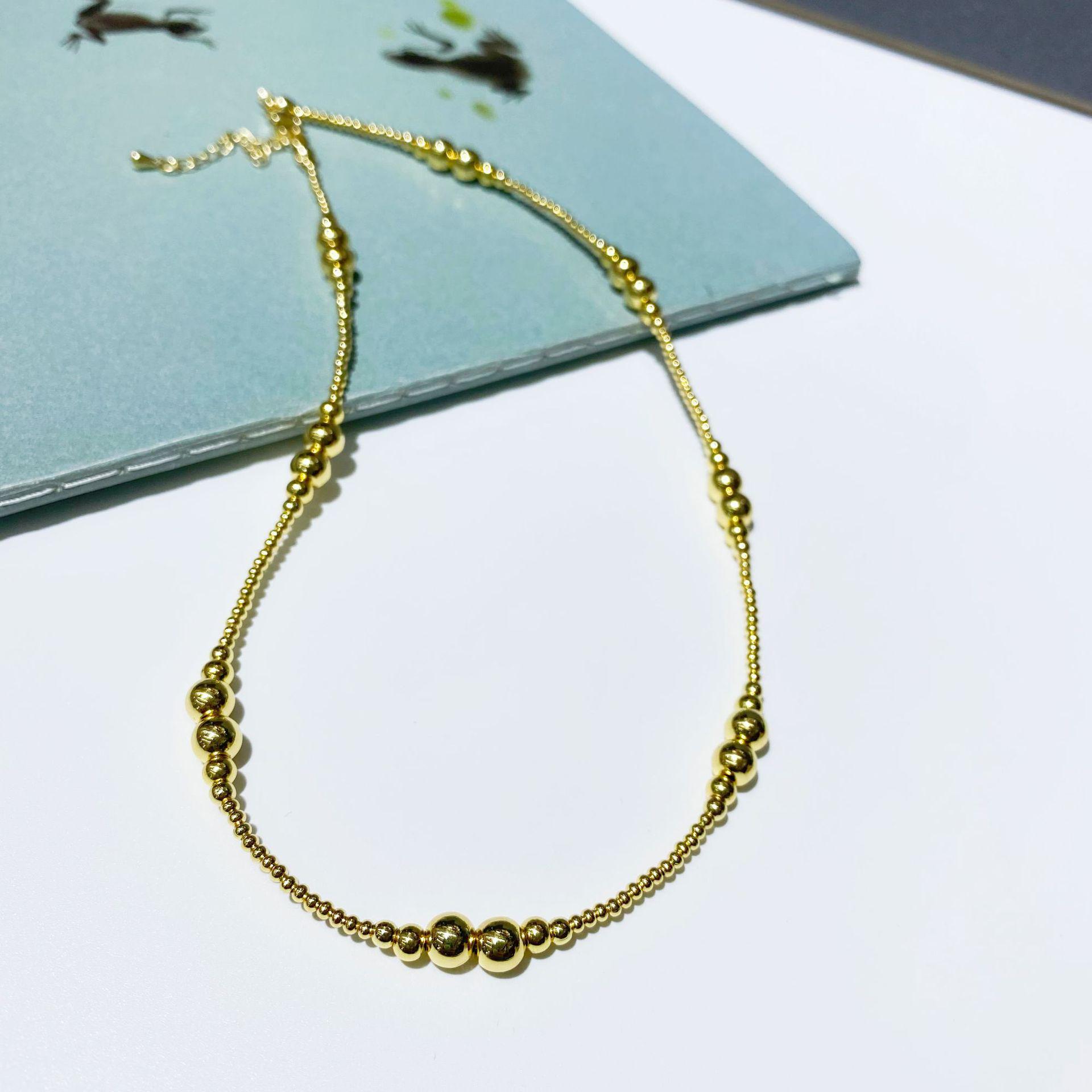 

Ожерелье ручной работы из жемчуга и стеклянных глаз с медными бусинами с золотым покрытием