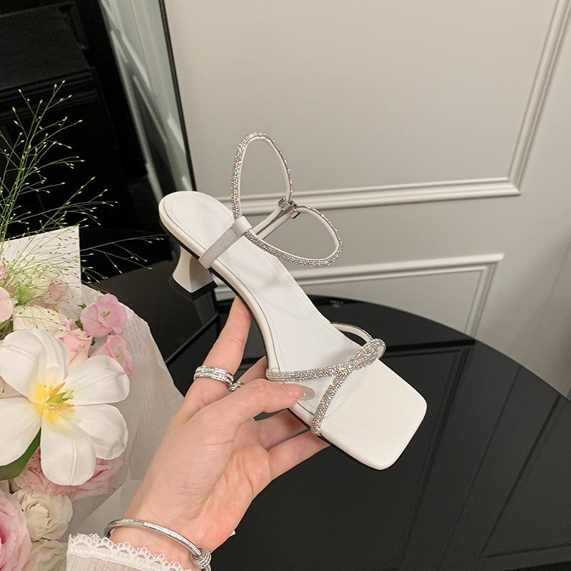 

Crossed rhinestone sandals female summer stiletto fairy wind one-word buckle strap open-toed square head purple high heels cut men 39