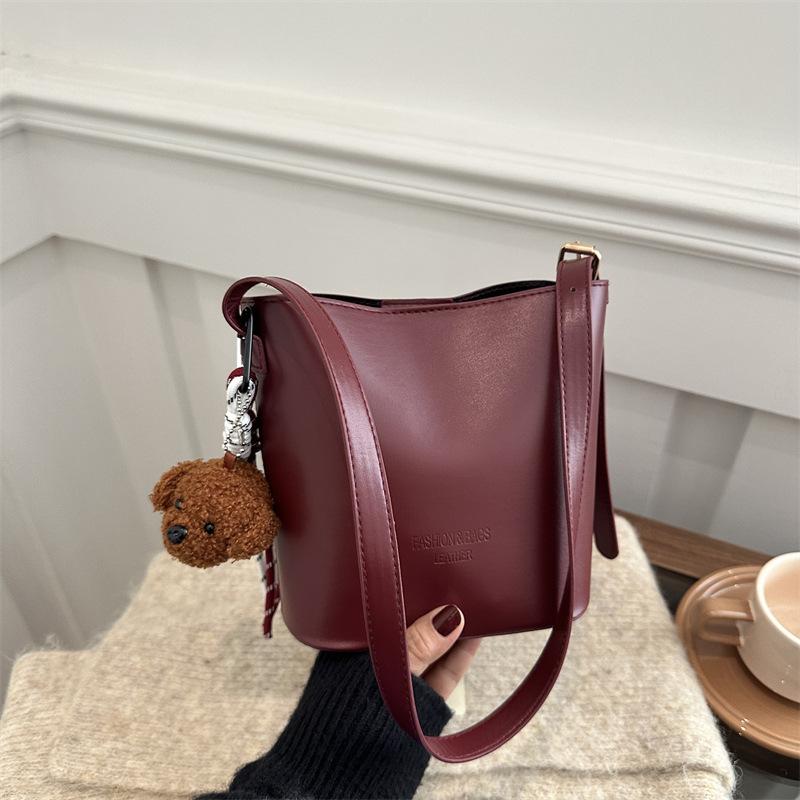 

Корейская ретро сумка-ведро женская 2025 новая простая модная сумка через плечо повседневная личность сумка-мессенджер для поездок на работу Without pendant красный