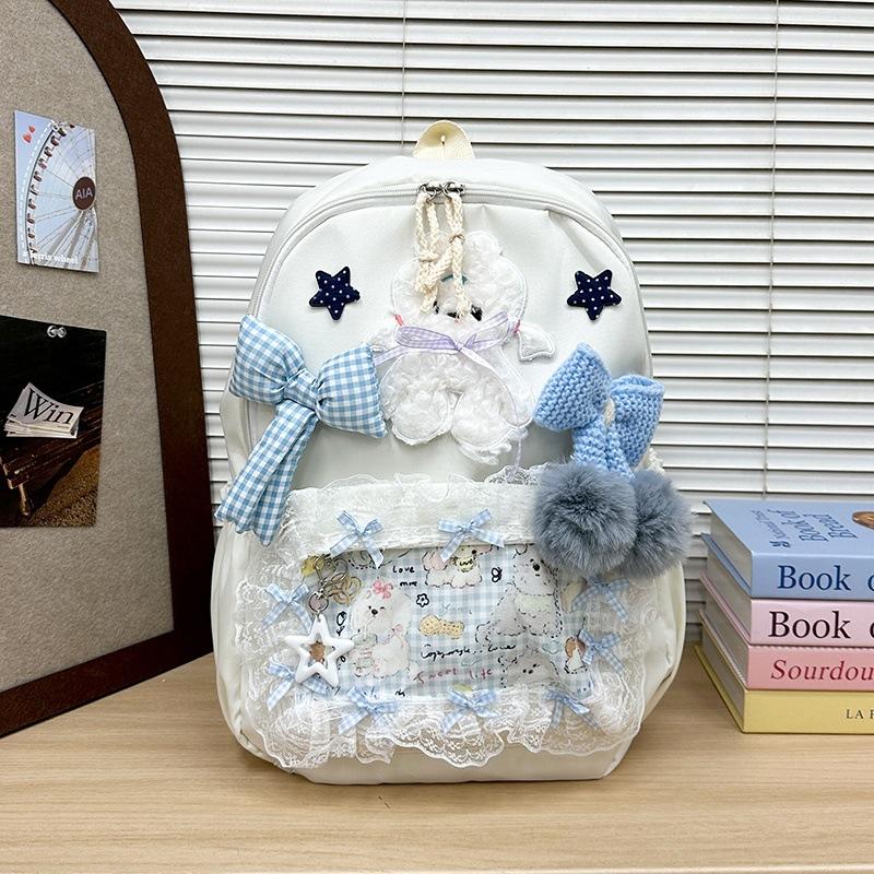 Schoolbag female college style Korean version backpack junior high school cute doll schoolbag outdoor travel backpack schoolbag female junior high