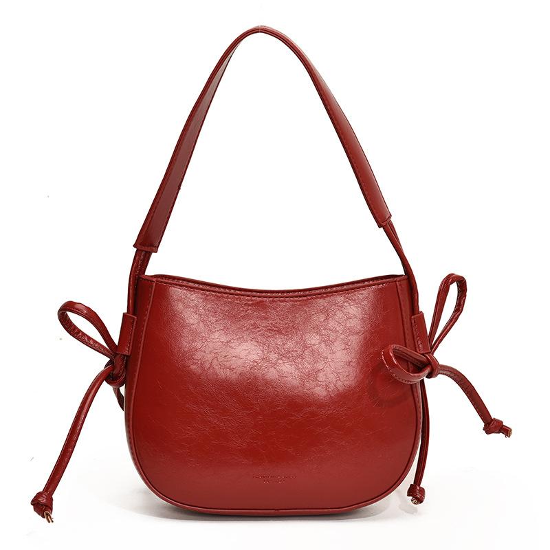 

2025 новая простая однотонная сумка-ведро с текстурой масляной восковой кожи, нишевая, для通勤, повседневная, универсальная, на плечо, мессенджер, женская красный