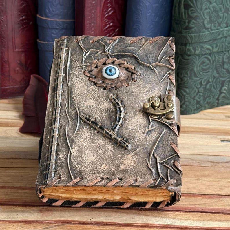 Handmade Leather Spellbook Journal - 7x5 Inch Fantasy Notebook with Eye Design, , Gothic Horror Grimoire, Evil Eye, Halloween