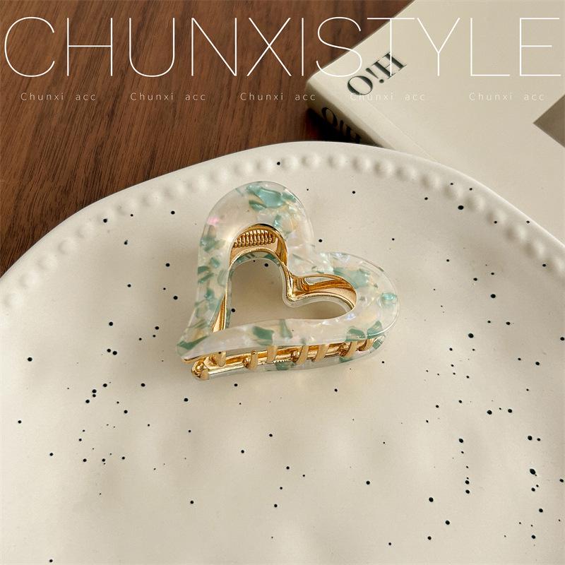 

Заколка для волос в форме сердца для женщин высокого класса - Маленький элегантный зажим для прически полупучок для высоких хвостов, Модный аксессуар 2024