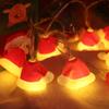 LED Christmas decorations, Christmas hats, festive atmosphere, Christmas tree decorations, colorful lights, string lights