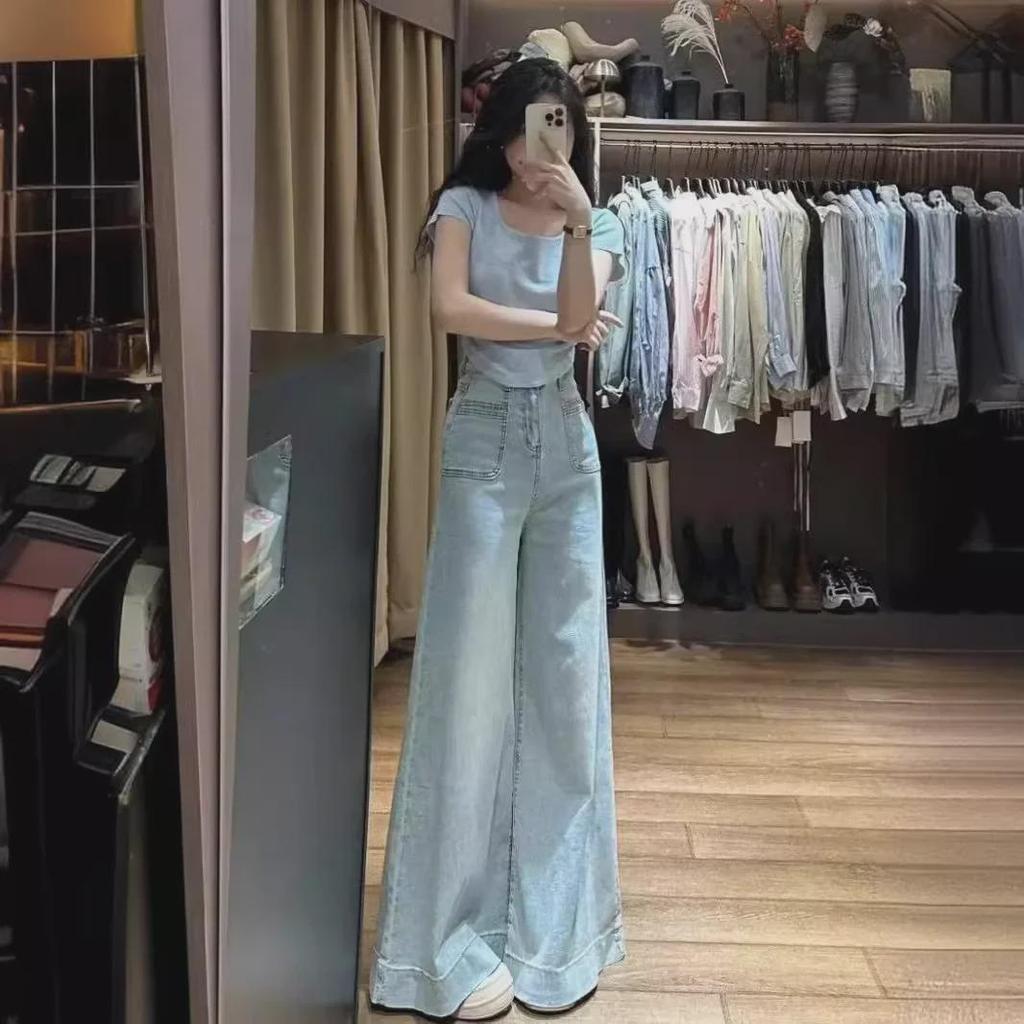 Women's High-Waisted Light Blue Wide-Leg Jeans - Spring/Summer 2024 Collection 