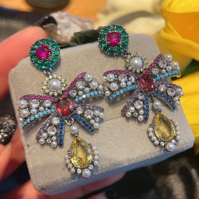 2022 neue Farbe Ethnischen Stil Bogen Simulierte Perle Ohrringe Farbe Passenden Zirkonia Persönlichkeit Net Rot Stil Ohrringe