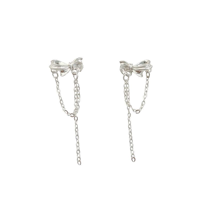 

Серьги-цепочки с кисточками в виде банта. Свежие пасторальные серьги. Милые и универсальные серьги для девочек.