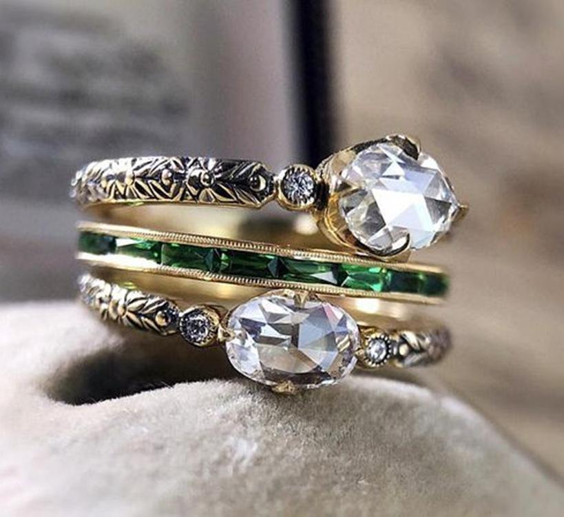 

Обручальное кольцо с бриллиантом и белым цирконом в форме яйца 5