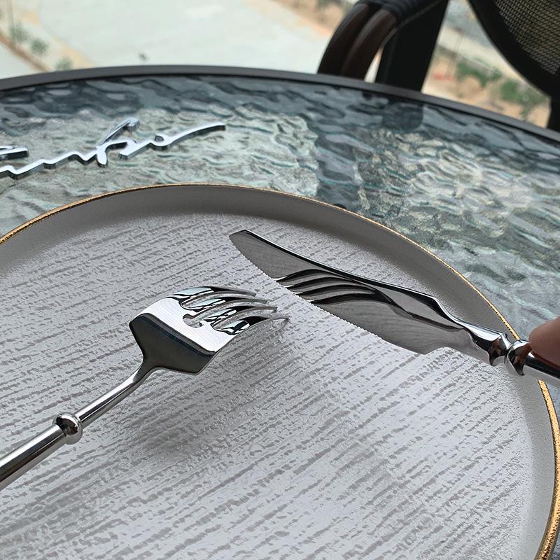 Elegant 304 Stainless Steel European Cutlery Set: Thickened Steak Knife, Fork, and Spoon for Hotel, Restaurant, or Home Use.