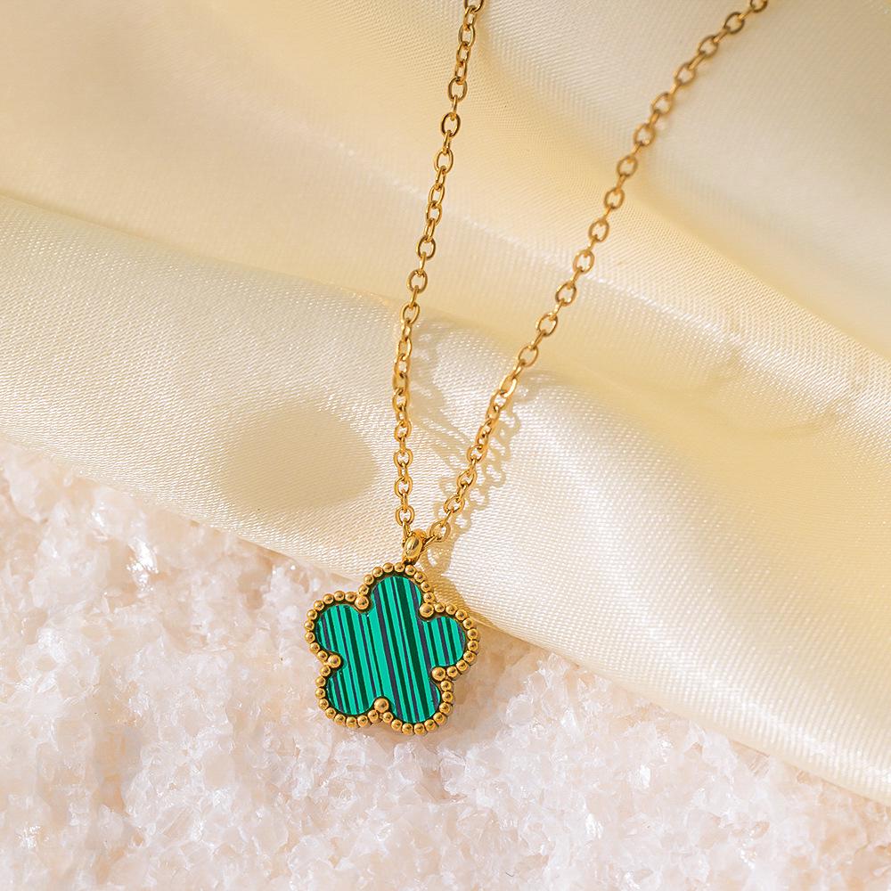 

Titanium Steel 18K Luxurious Polka Dot Double-Sided Mother-of-Pearl Clover Pendant Necklace for Women