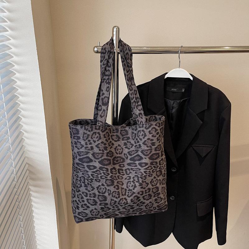 Leopard print canvas commuting lazy wind bag women 2025 casual fashion portable large capacity shoulder simple bag crossbody