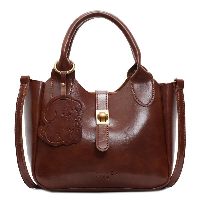

Trendy new British style niche retro oil wax leather bucket bag fashion versatile temperament portable messenger bag women коричневый