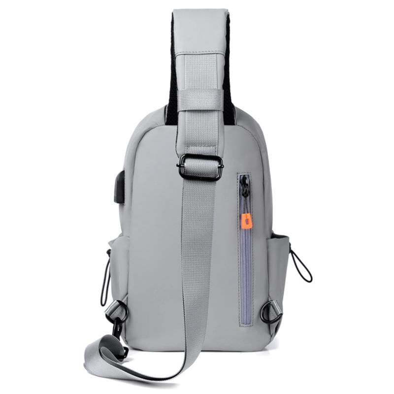 Neformální multifunkční pánská náprsní taška Trendy cool pánská taška Messenger s konektorem pro sluchátka USB nabíjení Prodyšná a pohodlná taška přes jedno rameno