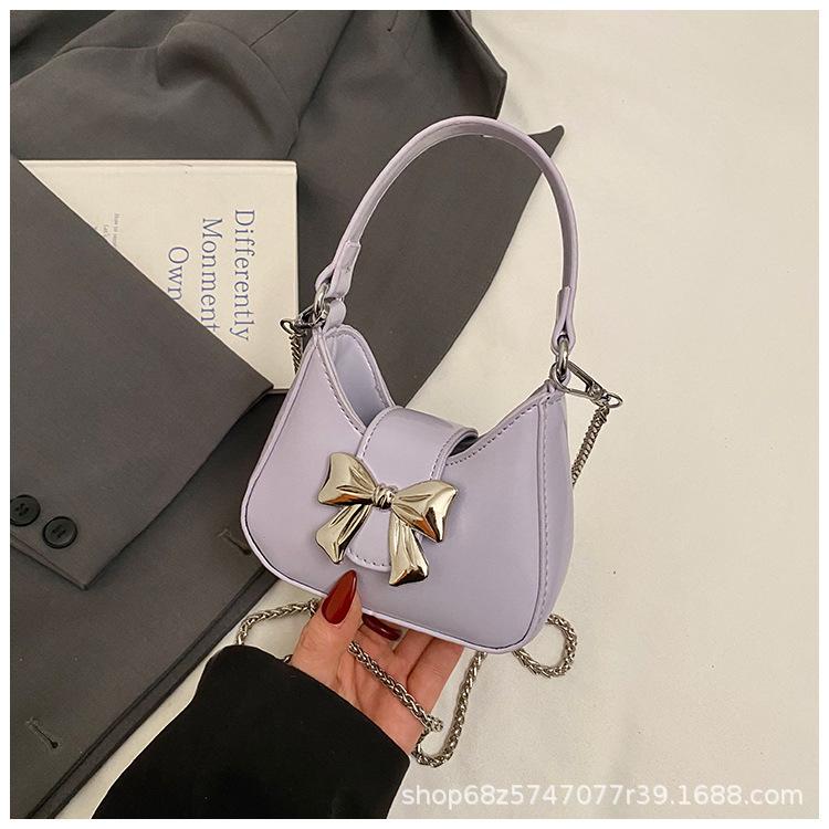 

Foreign style mini small bag women 2025 new Korean version versatile bow portable shoulder crossbody small bag mouth red envelope фіолетовий