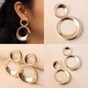 Elegant Metal Earrings With Geometric Shape And Gold Finish For Celebrations