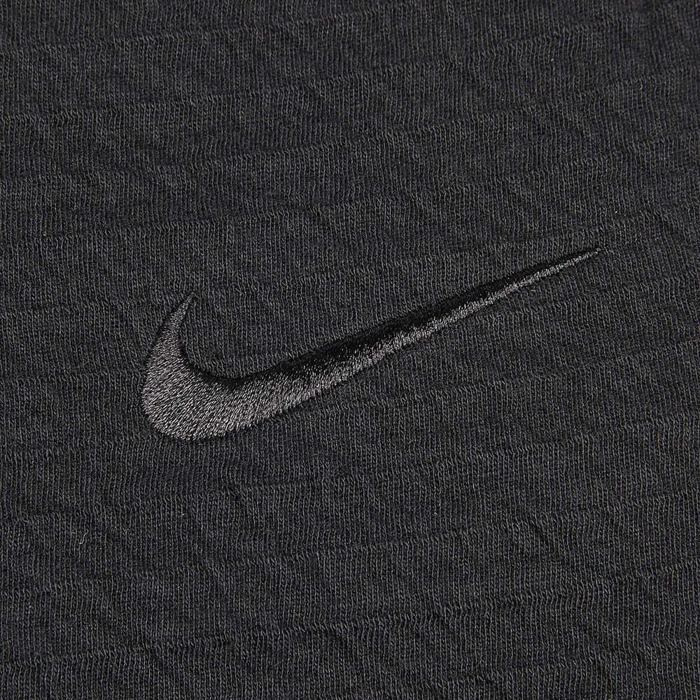 Nike Pánské pánské kalhoty s masivním texturovaným logem a stahovací šňůrkou černé DV9886-010