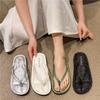 Neue chinesische Damen-Zehensandalen mit flachem Boden und Stickerei für den Sommer, neue Nischen-High-End-Zehen-Strand-Cool-Slipper