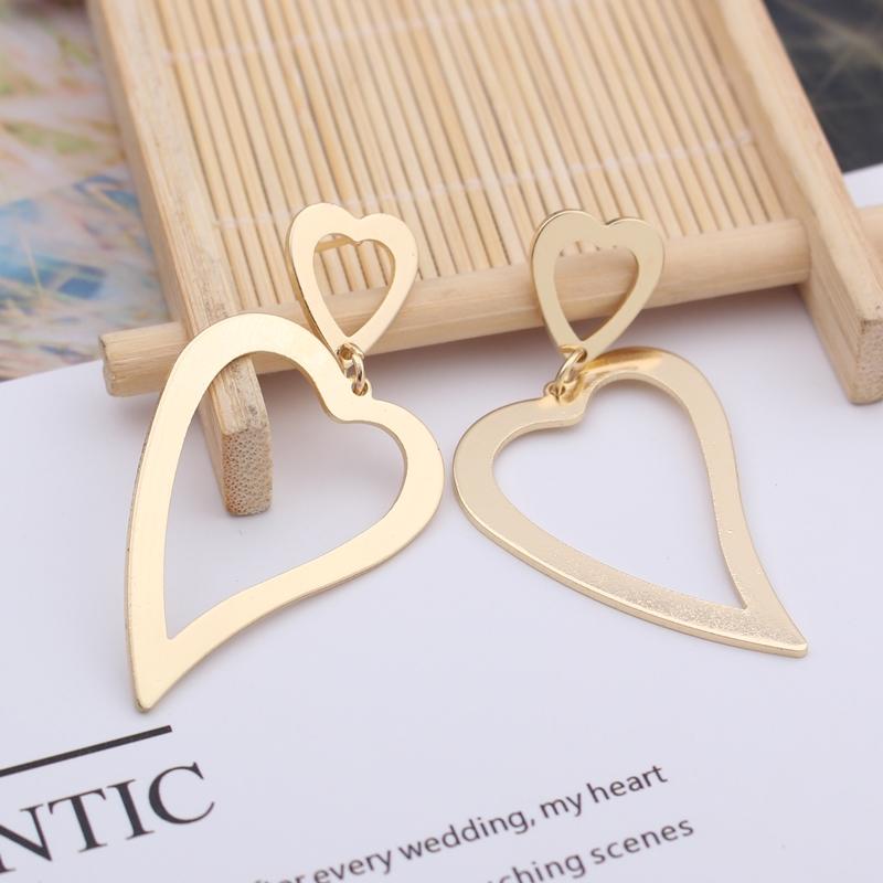 Przesadna geometria Nieregularne metalowe wiszące kolczyki Spiralny skręcony węzeł Okrągłe gładkie Brincos Cyrkonia