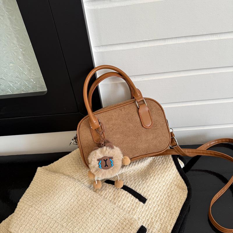 New retro fashion autumn and winter bowling bag women's literary solid color personalized casual Maillard style messenger bag