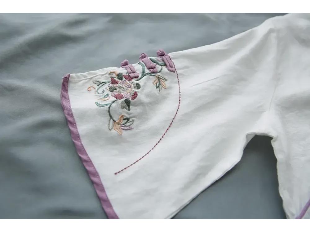 Chinese-Style Retro Cotton-Linen Mid-Sleeve Shirt with Stand-Up Collar and Embroidered Tea Service Design for Women.