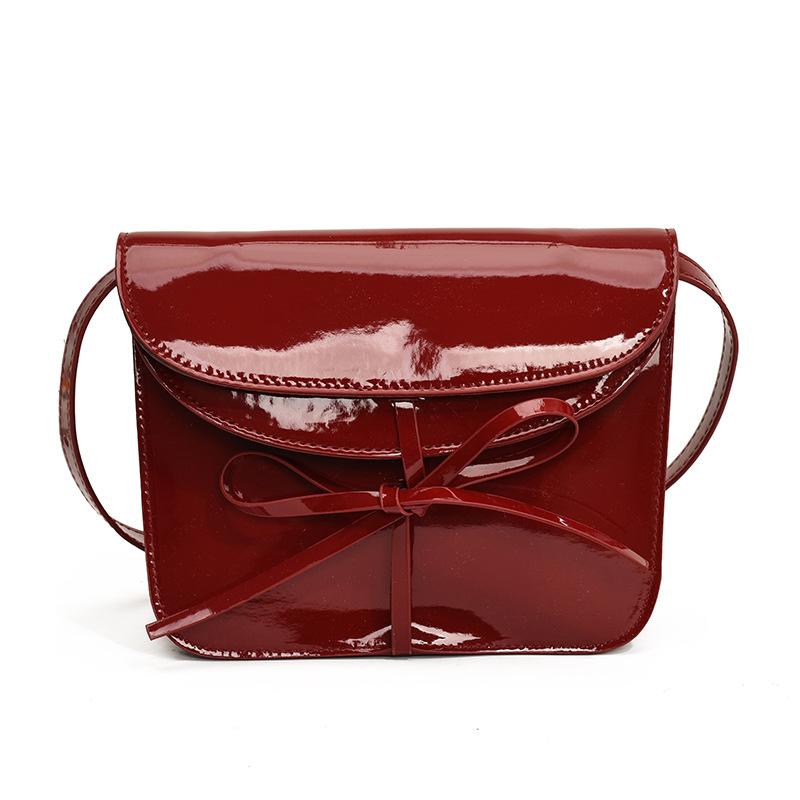 

New product explosion Korean niche oil wax skin ballet style bow envelope bag versatile temperament simple messenger bag women