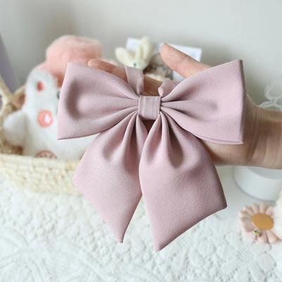 Mignon nœud papillon rose à gros nœud racine de plume géante douce fille douce nœud femme biseau matériau d'emballage
