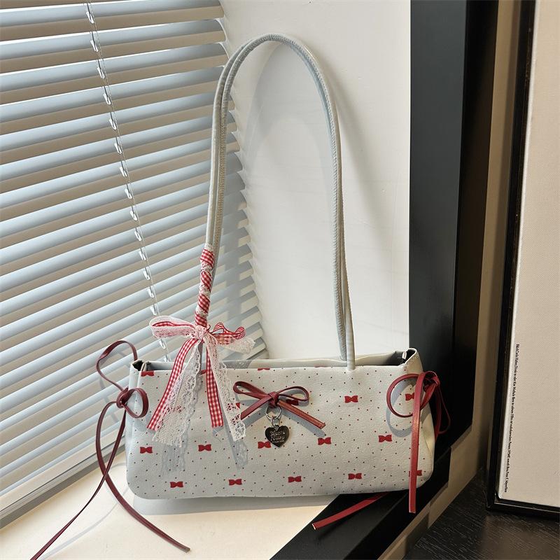 

Summer fashion versatile sweet bow armpit bag women s simple niche high-end shoulder handbag синій