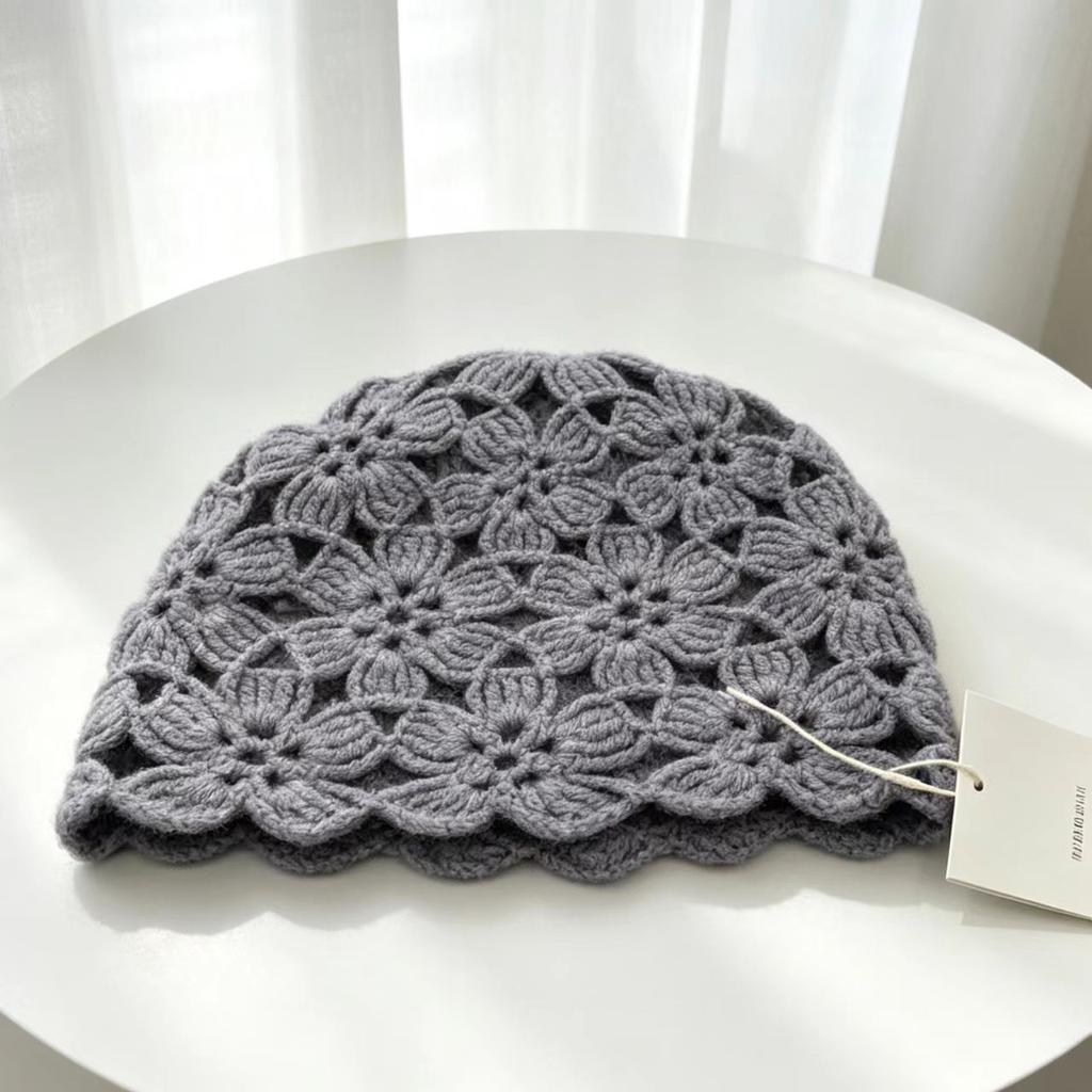 Knitted headgear autumn and winter thickened design fashionable plum blossom cold hat wool hat temperament