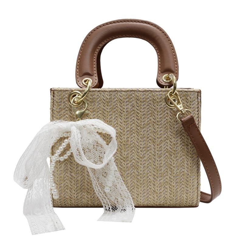 2025 new niche design fashion high sense straw woven portable Princess Diana bag foreign style versatile contrasting color messenger women's bag