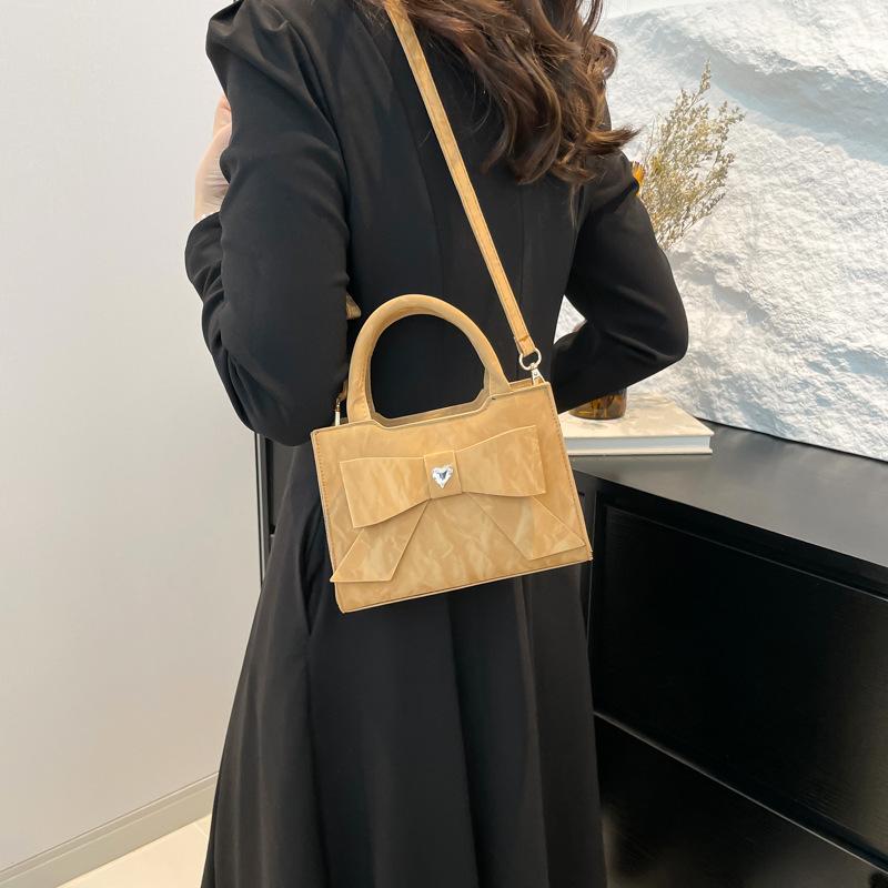 Highend fashion women's handbag bow simple shoulder messenger bag commuter versatile women's bag
