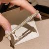 Plaid Gold Bracelet with Shiny Zirconia Ring – Luxurious, Fashionable, and Versatile Ins Style Jewelry.