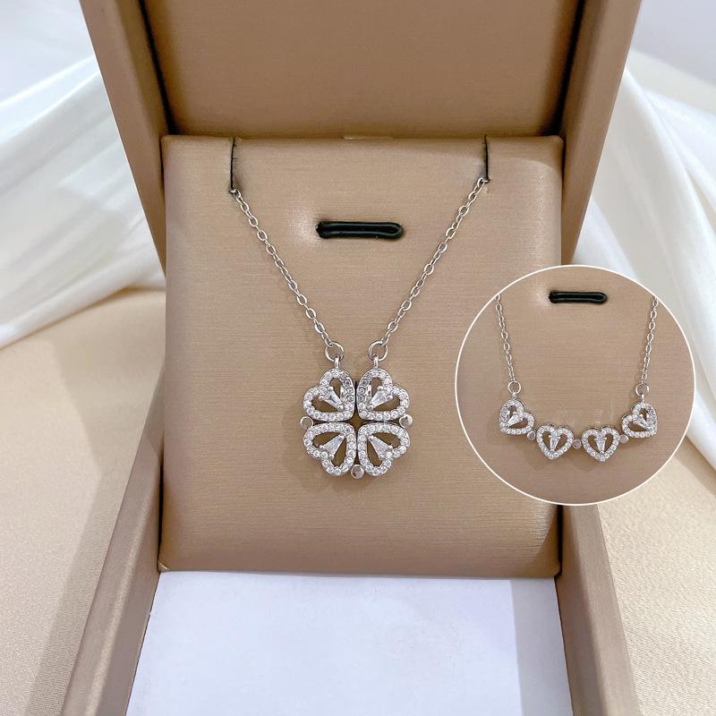 Zircón nuevo dos collares magnéticos de amor trébol de cuatro hojas temperamento lujo ligero cadena de acero de titanio.