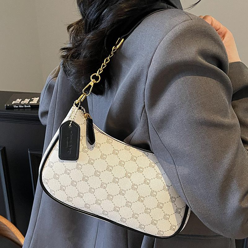 Beliebte einzelne Schulter Achseltasche Sommer neu einfach bedruckt Retro Baguette Tasche lässige Halbmondtasche Tide