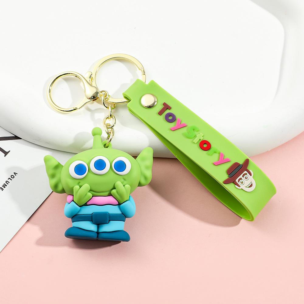 Best-Selling Toy Story Figures Keychain: Three-Eyed Alien, Buzz Lightyear, and Strawberry Bear Charms
