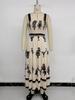 2026 Retro Ethnic Vacation Dress: European & American Spaghetti Strap Style