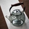 Transparent Black 1000ml High Borosilicate Glass Teapot with Starry Sky Top Bead and Integrated Lifting Handle