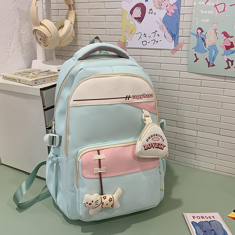 

Весна Новые мужские и женские рюкзаки большой вместимости для средней школы и старшей школы, тренд на снижение нагрузки для студентов колледжа, рюкзак .