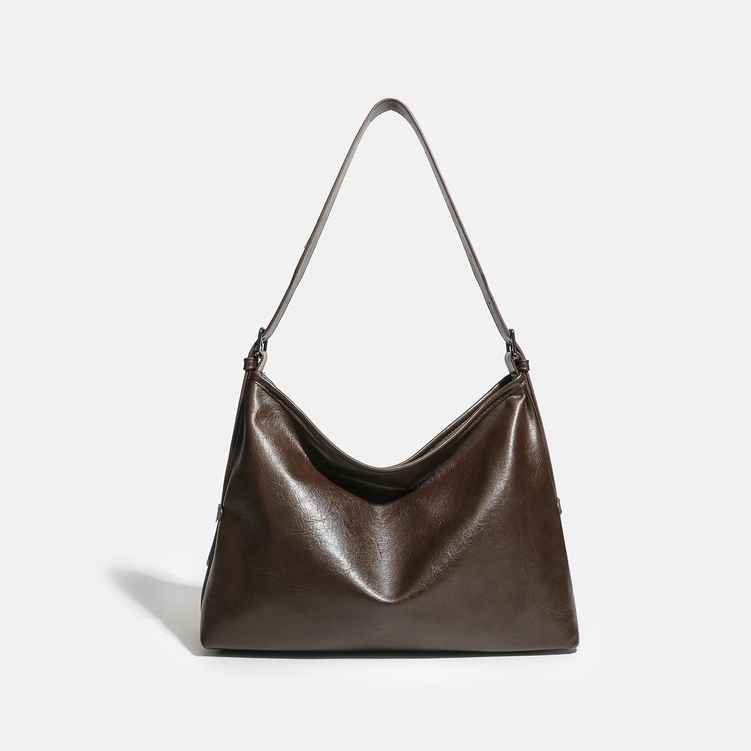 

Fashionable Oil Wax Leather Tote Bag for Women, Large Capacity and Relaxed Soft Leather Commuting Shoulder Bag темно-коричневого кольору