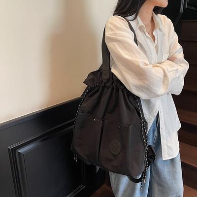 Neue Mode leichte Tasche Damen neue Kordelzug-Reisetasche Studenten-Schulranzen hochwertiger lässiger Schulter-Rucksack