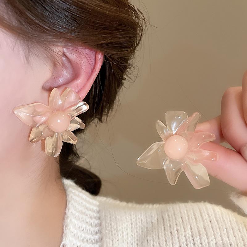 Boucles d'oreilles bohèmes roses à fleurs de perles de rocaille et pompons de perles