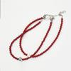 tout red brick ball necklace