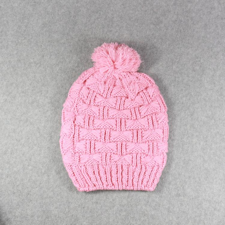 Autumn and winter three-dimensional twisted knitted hat, pink hairball thickened warm wool hat, men's and women's cold-proof pullover hat