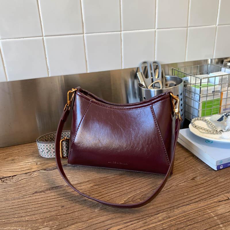 

Niche French retro underarm bag women s 2025 autumn new fashion commuter baguette bag temperament shoulder handbag бордовый