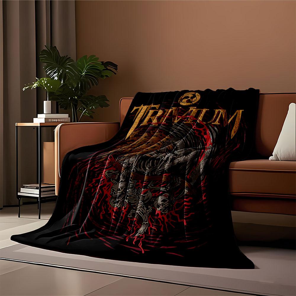 A Swirling Skeletal Design with Horns, Scythe, and Blood-like Accents. for All Seasons Blanket Lunch Break Throw Gift