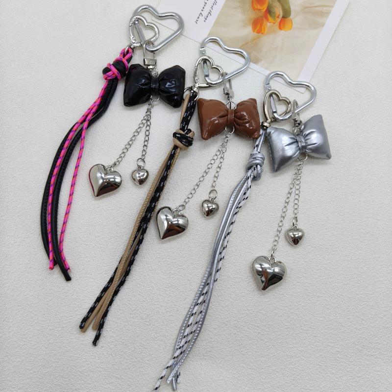 New Leather Heart Pendant Bag Keychain with Braided Rope and Bow Design