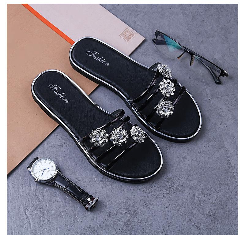 Neue Outdoor-Bekleidung Sommer Halbschlepp Mode Blume Strandschuhe Sandalen Flache Lässige Flip-Flops