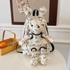 off-white rabbit doll