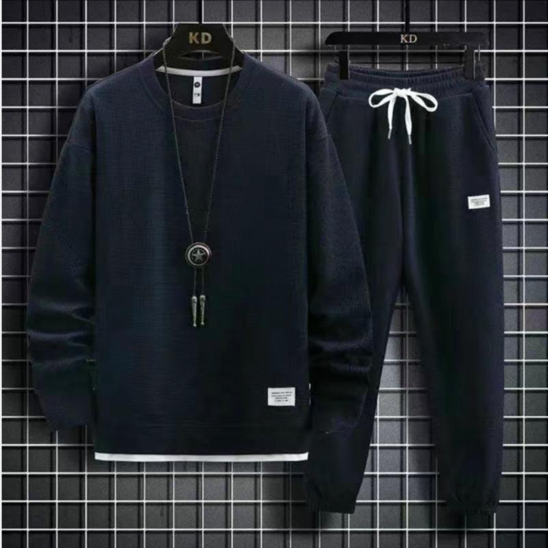 

Костюм-свитер из однотонного вафельного трикотажа - свободный покрой для отдыха в стиле Гонконга на осень/зиму 5XL