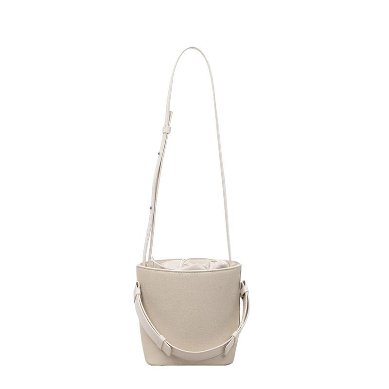 Niche design contrasting color portable bucket bag women's 2025 new casual retro handbag Korean version shoulder messenger bag